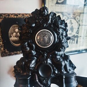 Oddities-Black Ornate Cherub Display with preserved Spiderweb